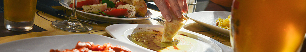 Eating Indian at Cafe Bombay restaurant in Atlanta, GA.